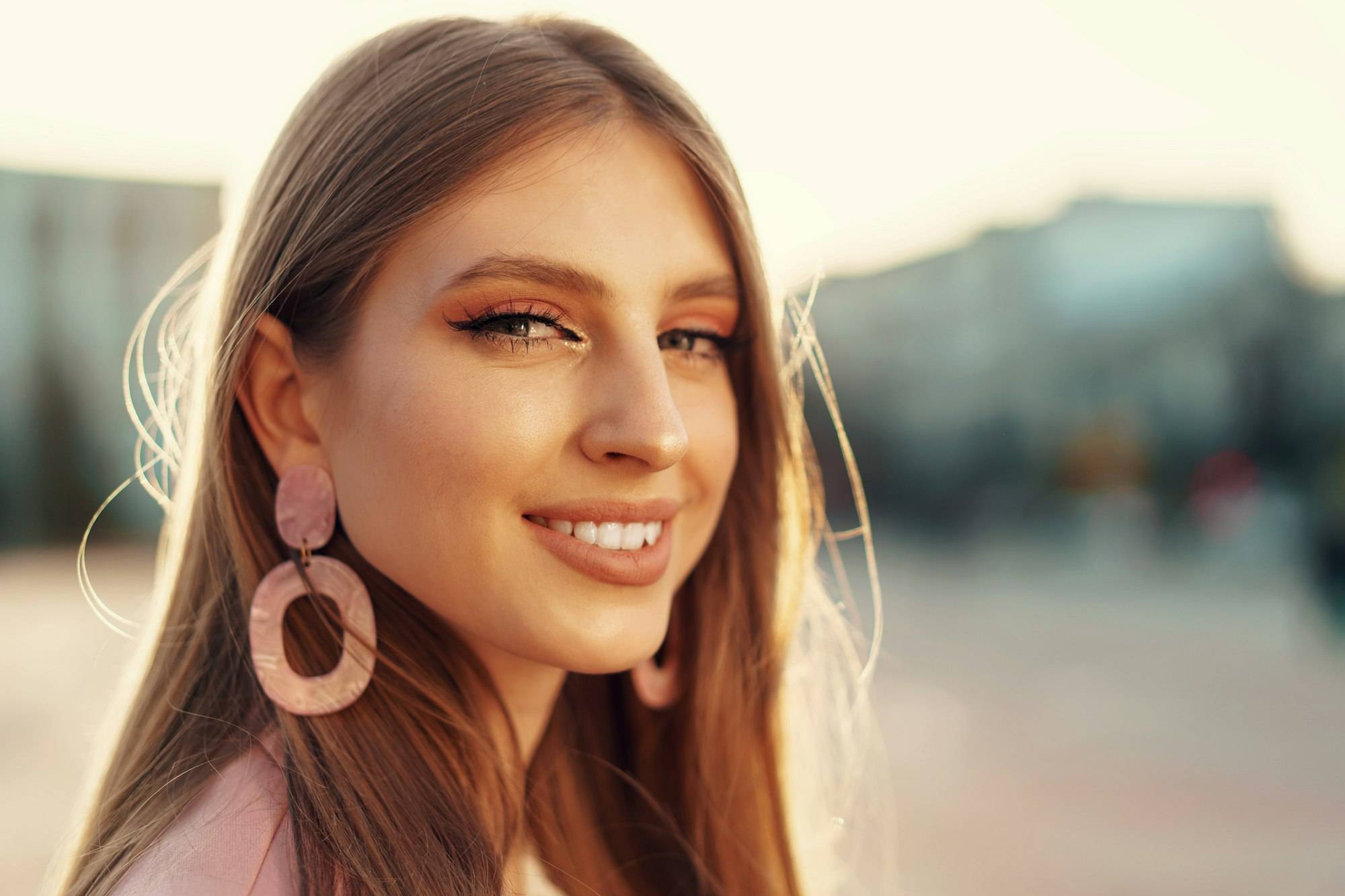 Close up portrait of a woman walking in the street